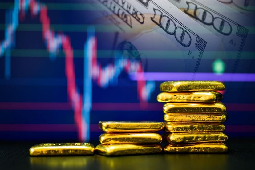 Gold Holds Near $5,000 As Dollar Eases Before Federal Reserve