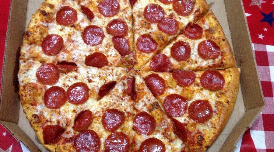 Domino's Pizza (NASDAQ: DPZ) Stock Hits 52-Week Low Amidst CEO Transition